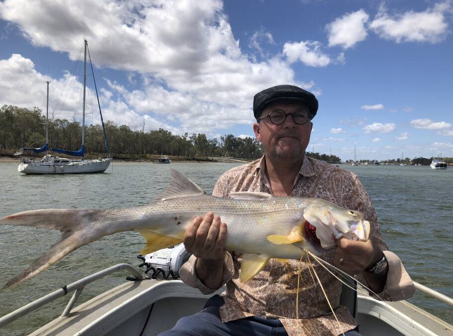 IN THE SHALLOW: Damien Atkinson landed a threadfin on prawns from the shallows. 