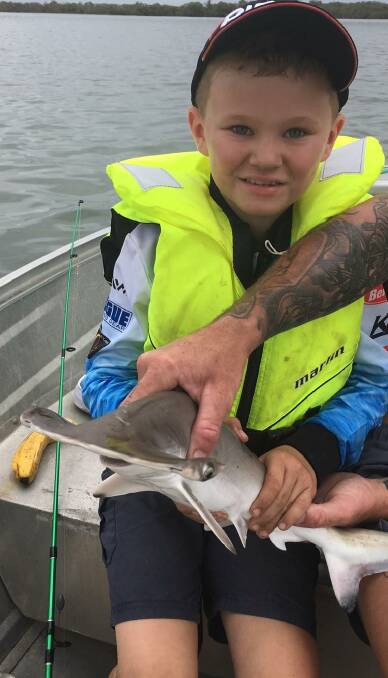 GOOD CATCH: Mason Saunders, 7, was stoked to catch and release a little 1m hammerhead shark near Slipping Sands.