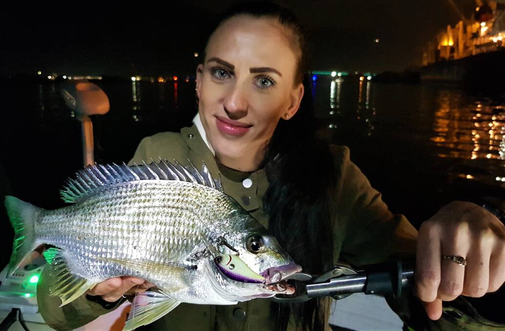 GOOD BREAM: Tara Mills with a bream caught on a Jackall Aska lure in the Brisbane River.
