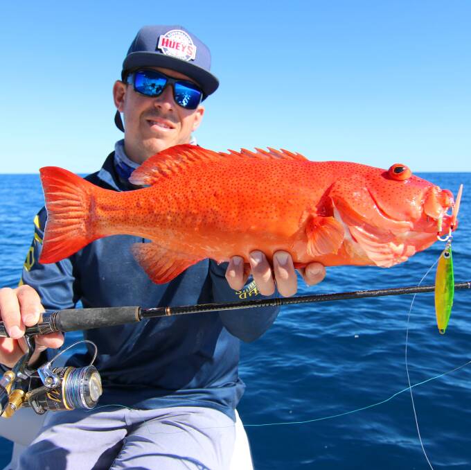 CATCH AND RELEASE: Steven Ward with a coral trout caught on a jig off Cape Moreton and released. 