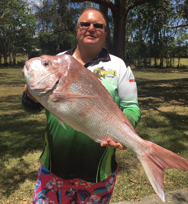 SNAPPED UP: Dan Andrews with a 6.8kg snapper caught at Harry's Artificial Reef at 9am Saturday. 