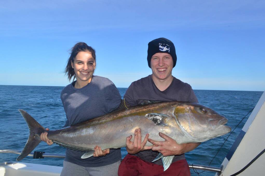 HUGE CATCH: John and Rachael Brown with a samsonfish caught on holidays on board Keen As Charters, Marion Bay, South Australia. 