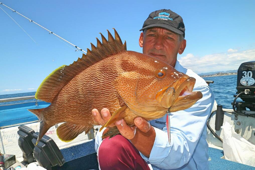 HUGE COD: Steve Gregory with a solid Maori cod caught off the seaway on a jig.