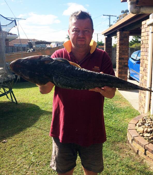 BIG FLATHEAD CATCH: Andrew Brehmer with a 73cm, 2.7kg flathead from Jumpinpin. Picture: Supplied. 
