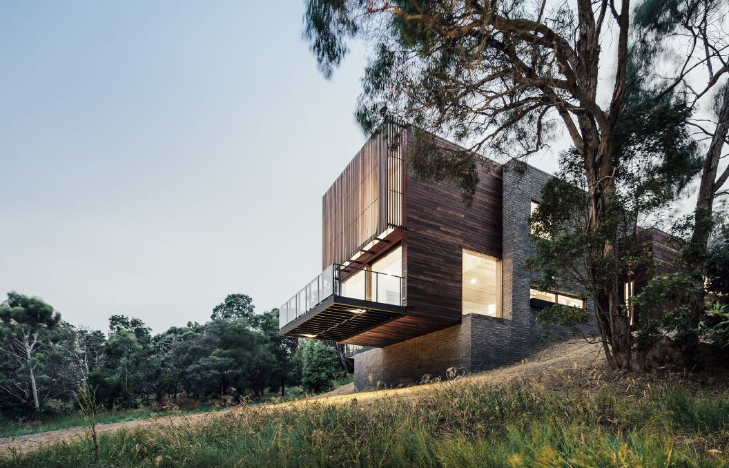 RIGHT AT HOME: The Invermay House used to stand out, but as the timber continues to age is blending more into the tones of the surrounding bushland. Photos: Michael Kai. 