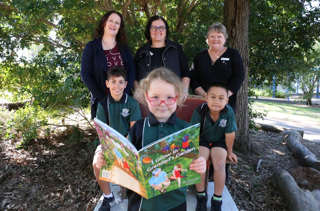 GROWTH: The Salvation Army coordinator Sharon Kruger, school chaplain Carol Cock and principal Jacqueline Fiedler with students Frankie Smedley, Monika-May Bricknell and Bill Beckham at the think and thank seat reading the book's symbolism. Photo: Jocelyn Garcia