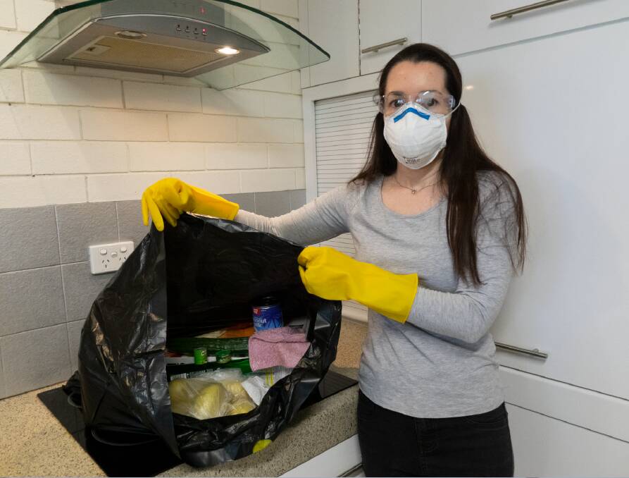 HEALTH HAZARD: Lisa Clark of Cleveland was advised to only enter the kitchen with glasses, a mask and gloves in case of contamination and was forced to throw out her groceries.