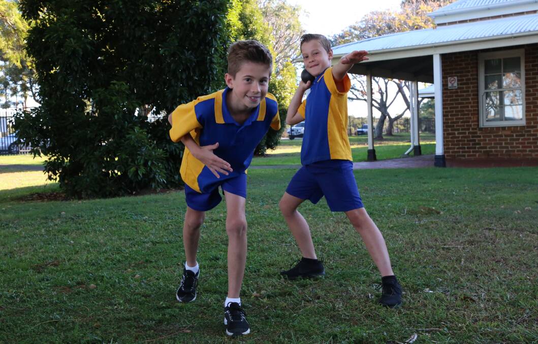 WINNERS: Lucas McPherson and Hayden Hardy made new records in their favourite category at Brikdale State School's athletics carnival. Photo: Jocelyn Garcia