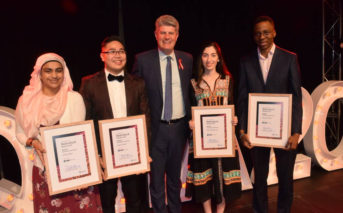 RECOGNITION: Queensland Multicultural Awards ‘Outstanding Individual Achiever 2018’ category Finalists Imaan Ashraf, winner Ralph Teodoro, Minister for Multicultural Affairs Stirling Hinchliffe, Madina Mohmood and Nkosana Mafico.