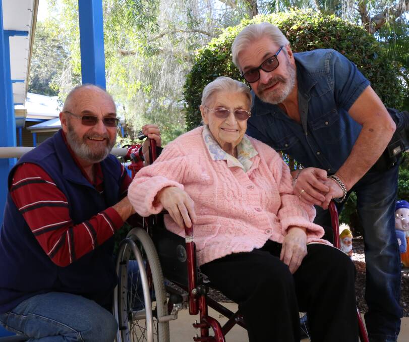 READY TO CELEBRATE: Annie Hudson with her sons John and Roy, days before her 104th birthday. Photo: Jocelyn Garcia