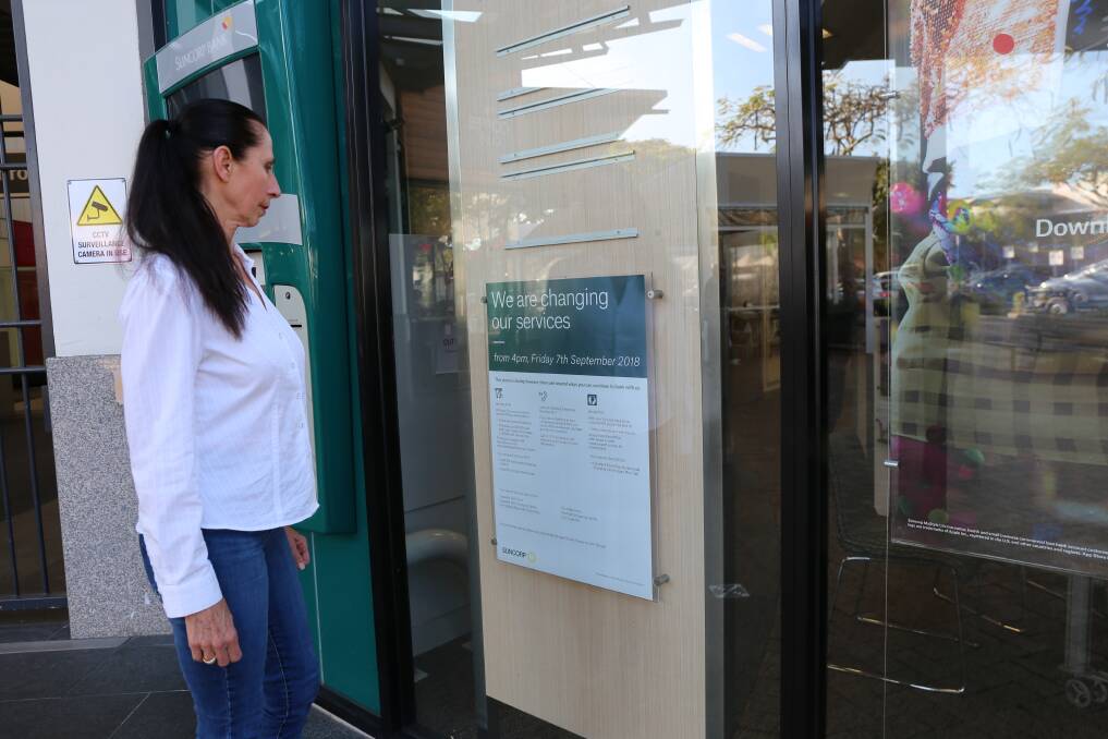 NOTICE: Suncorp has put a sign to notify customers of the alternative banking methods when the branch closes.