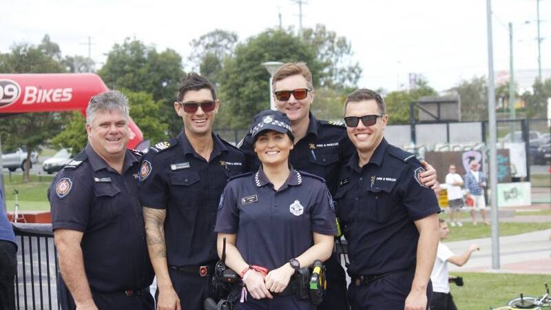Emergency services pose for happy snap. Photo: Queensland Police Service