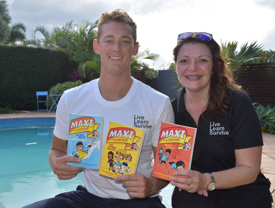 LIFESAVERS: Trent "Maxi" Maxwell with Live Learn Survive business partner Leigh Mason. The two hold up the Maxi the Lifeguard series. Photo: Hannah Baker