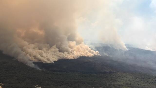 Photo of bushfire at Straddie on December 1. Photo: QFES