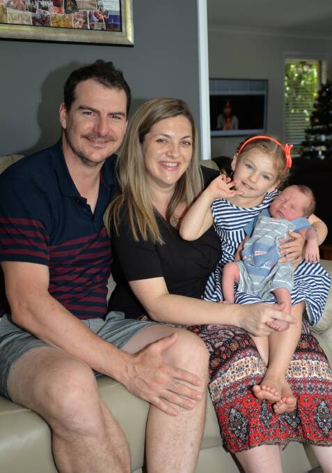 WELCOME ARRIVAL: Mount Cotton's Glenn and Charlotte Ward with their daughter Evaline, 3, and newborn son Bastien, who was born on Monday, January 1 at 10.09am. He weighed 3.3 kilograms. Photo: Hannah Baker 