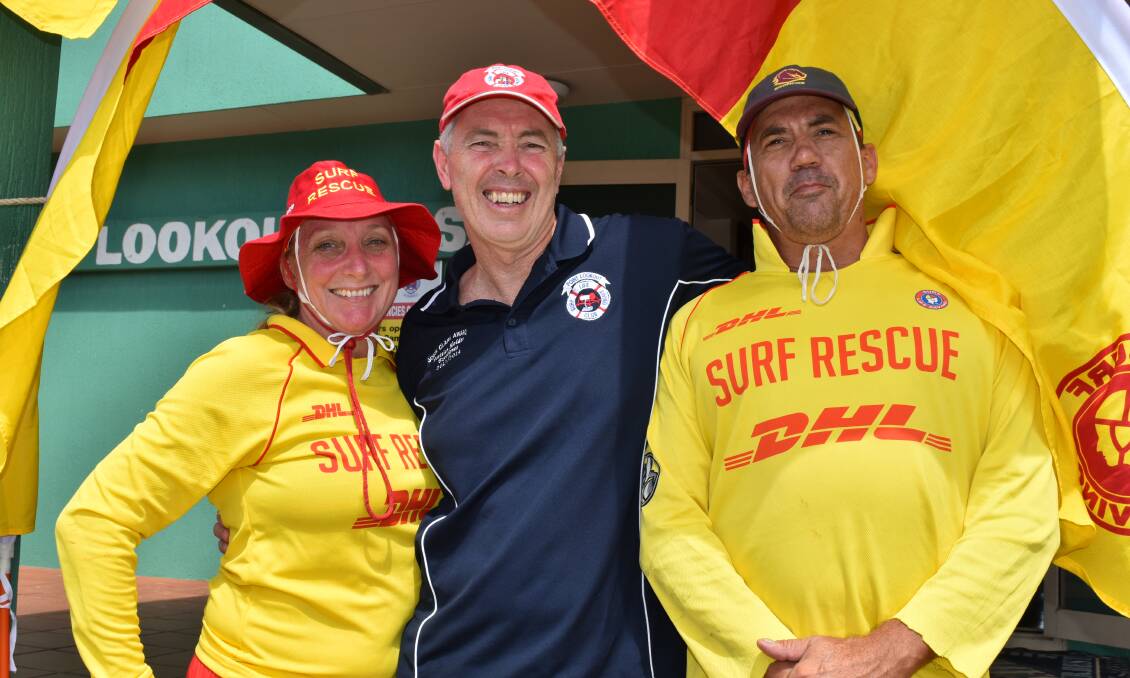 Volunteer lifesavers Peta and Vince patrolled beaches during the fundraiser. They are pictured with club president Sean Fallon. 