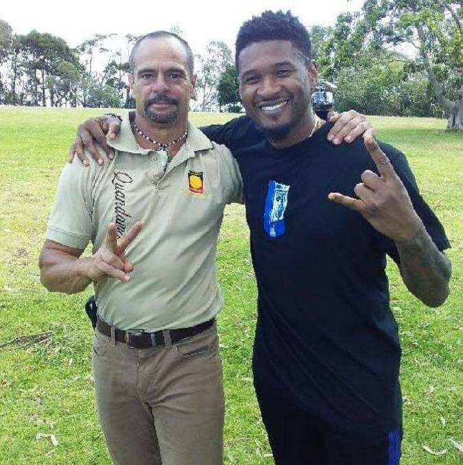 HAPPY SNAP: This photo was shared by Redland City Council on their Facebook page. QYAC ranger Matt Burns with Usher. Photo: @melasqeesian on IG