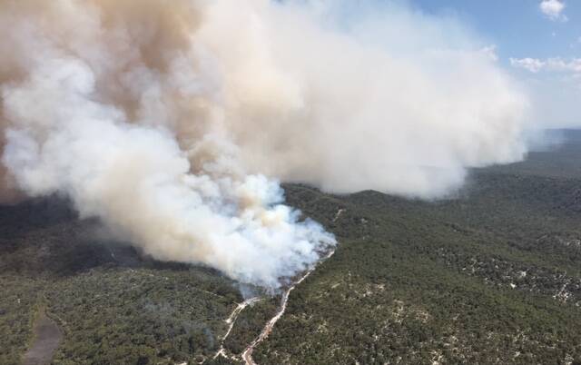 BUSHFIRE: Photo of fire at North Stradbroke Island taken on Saturday, December 1. Photo: Queensland Fire and Emergency Services