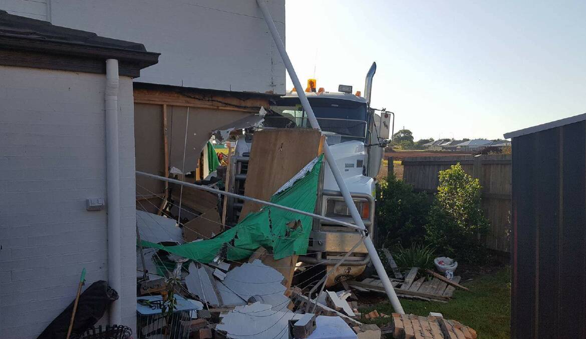 HOUSE IN RUINS: The truck ran into the side of the house.