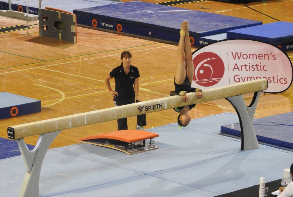 Doreen performing her winning beam routine at the state championships earlier this month. Photo: Supplied