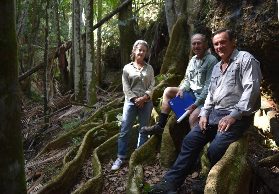 MAGICAL: Redlands Bushwalkers Club president Tracy Ryan, committee member Don Baxter and vice president Peter Endercott in the conservation area near gate nine. Photo:  Hannah Baker