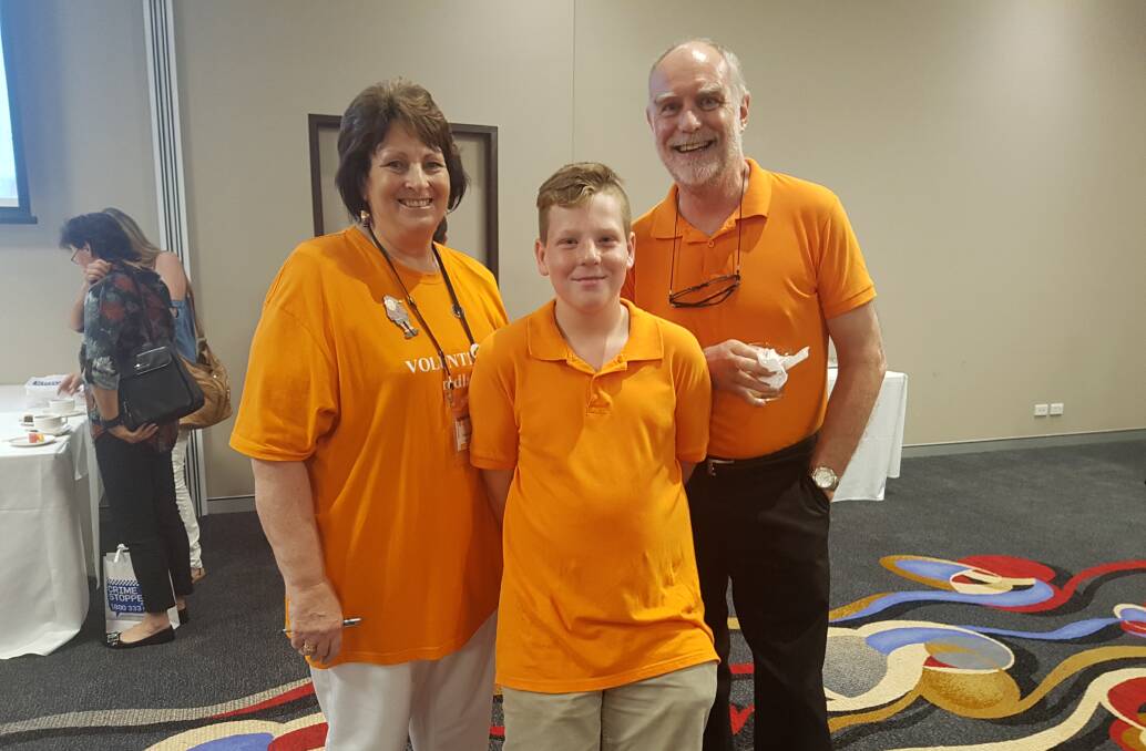 Deborah Tearle with her grandson Ethan and volunteer Owen Davis. Photo: Supplied
