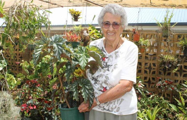 Isobel was passionate about her begonias and other plants. Here she is pictured in 2016. Photo: Cheryl Goodenough