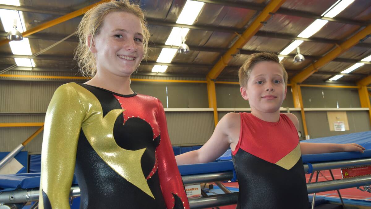TRAMPOLINE CHAMPS: Redland City Gymsports students Charlotte Johnstone and Hamish Wilson are ready to compete at the National Gymnastics Championships.