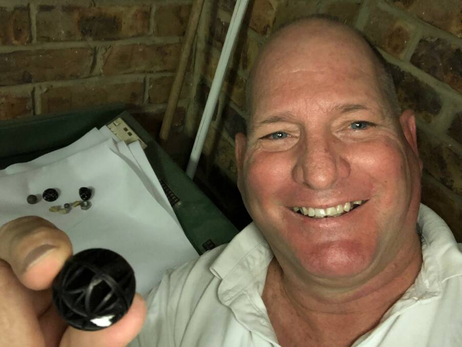INVENTIVE: Capalaba man Creig Adam has developed a device to hold sinkers easily in place on fishing line. Photo: Hannah Baker