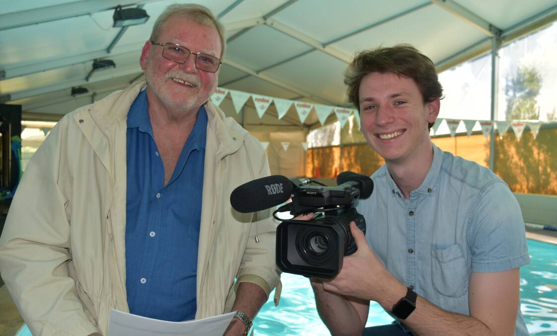 Former Cleveland District State High School film studies teacher and Brisbane region subject chairman Wayne Cass with Daniel Helmstedt, whom he taught. Their film, Barry Eldridge - a life in water, will be premiered at Cleveland District State High School on Wednesday, August 8. Photo: Hannah Baker 