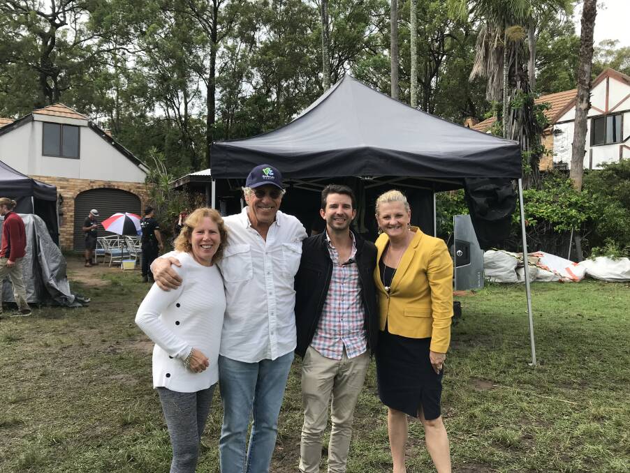 SCENIC SET: Redland City councillor Tracey Huges, Monster Problems executive producer John H. Starke, location manager Damian Lang and Redland City mayor Karen Williams at the Alexandra Hills home during filming. Photo: Redland City Council