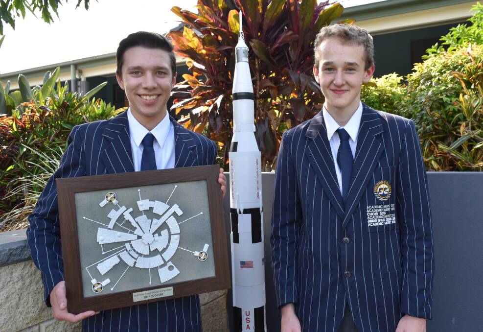 MARS MISSION: Trent Neilson and William Bye will represent Australia at the International Space Settlement Design competition at Florida's NASA Kennedy Space Centre in June. Trent holds the school's award won at the Australian Space Design Competition in January. Photo: Hannah Baker