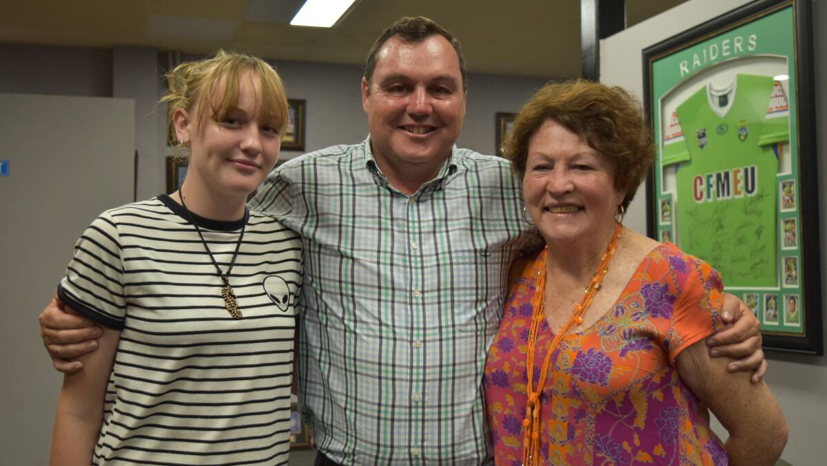 Former Redlands MP Matt McEachan with his daughter India, 13, and mother Carolyn Cook at his election night party at Redlands Rugby League Club. Photo: Hannah Baker