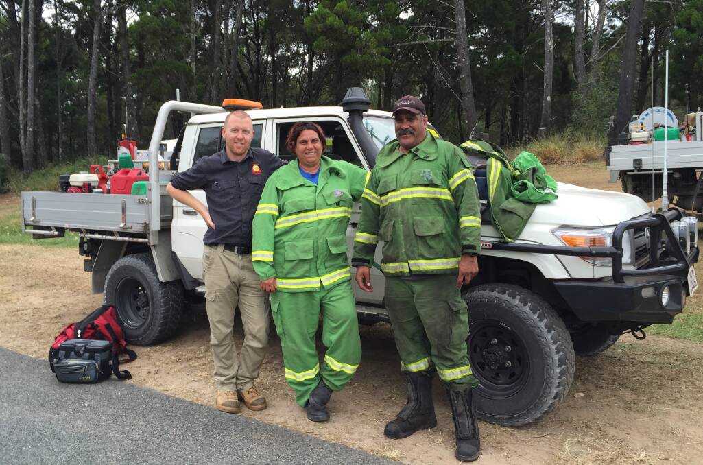 TOP EFFORT: More than 250 firefighters, police and support crew from QFES, Redland City Council,Quandamooka Yoolooburrabee Aboriginal Corporation, National Parks and Wildlife Service, Energex, Sibelco and Seqwater helped containment efforts. Photo: Redland City Council