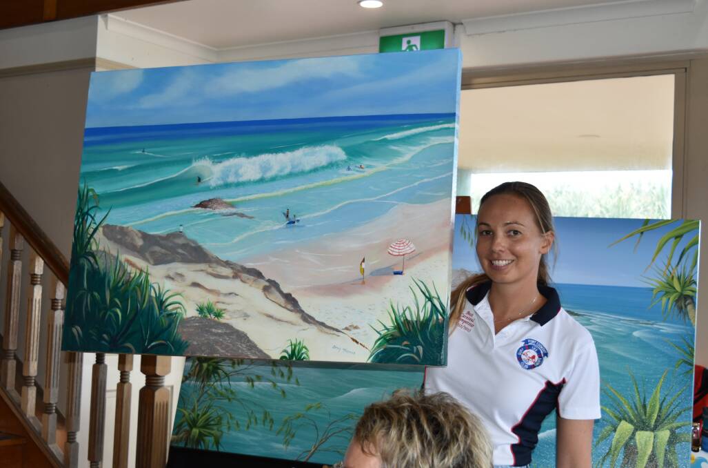 Items, including paintings by Scott Christensen and Indigenous artwork, were auctioned off to raise money for the club.
