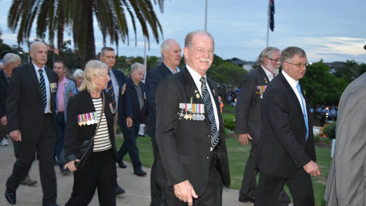 Veterans march from the dawn service at Cleveland.