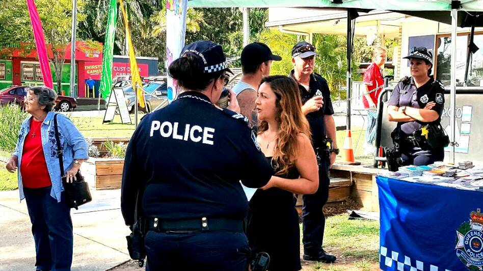 Police chat with locals.