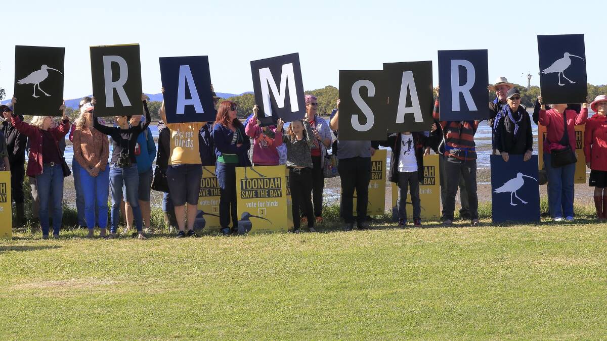 A human chain along the foreshore was formed, calling for the Ramsar site to be respected. Photo: Chris Walker