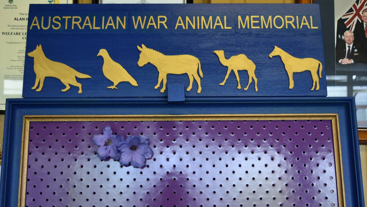 POPPY BOARD: The Australian War Animal Memorial board to be pinned with purple poppies by children after Cleveland's main service, which begins at 11am. Photo: Hannah Baker