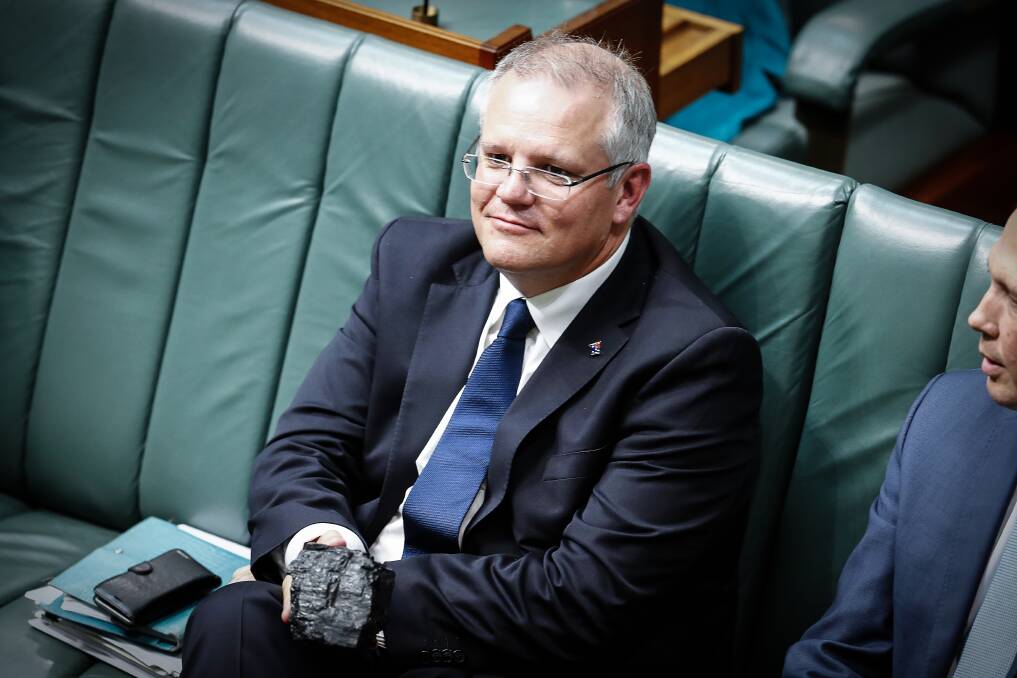 Treasurer Scott Morrison with a lump of coal during question time in 2017. Picture: Alex Ellinghausen 