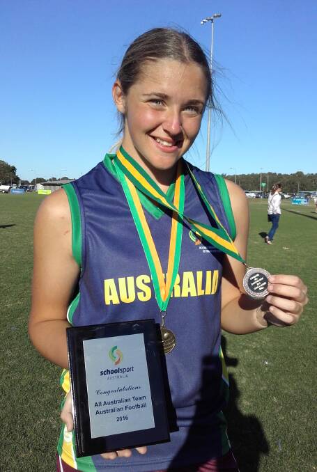 AFL: Tarni White wins Player of the Championships as a member of the  Queensland School Sport Girls 15 and Under  team.