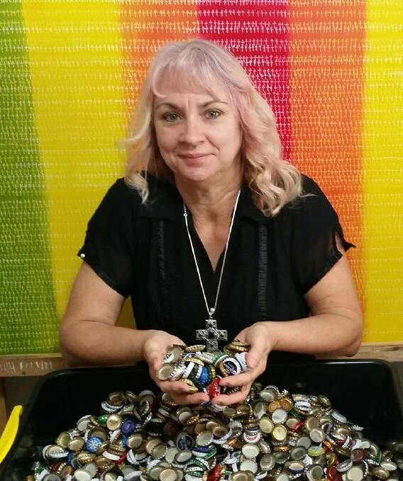 BOTTLE CAPS: Beverley Teske is collecting bottle caps as part of an installation remembering fallen soldiers