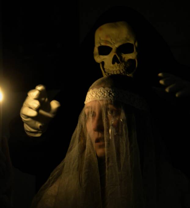 DARKNESS: In the darkness, the stories come out at the Redland museum. Photo: Greg Pope.