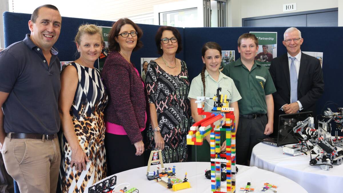 EXCELLENCE:  Member for Capalaba Don Brown, Mayor Karen Williams, QUT Assistant Dean Karen Whelan, Alexandra Hills SHS Principal Gail Armstrong, students Samantha Beattie and Jayden Clarkson, and QMEA Chair and QRC Chief Executive Michael Roche celebrate the Centre for Excellence at the Alexandra Hills High School. 