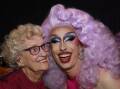 DRAG: Lulu Le Mans shares some make up tips with Collie Nestor, 90, of Wellington Point at the July drag brunch. Lulu said she rolled out of bed and came straight to the gig while Collie said she was keen to learn the craft.