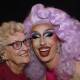 DRAG: Lulu Le Mans shares some make up tips with Collie Nestor, 90, of Wellington Point at the July drag brunch. Lulu said she rolled out of bed and came straight to the gig while Collie said she was keen to learn the craft.