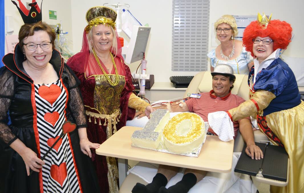 CELEBRATION: The nurses of the Redland renal dialysis unit celebrate the unit's decade with patient Rodney Smith.