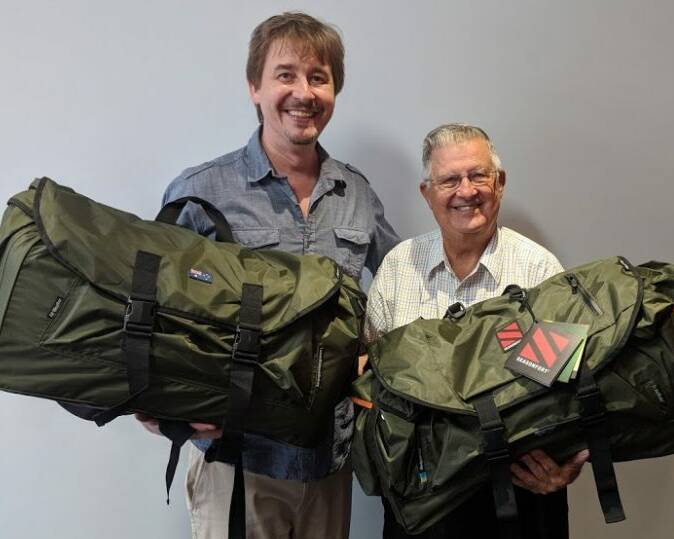 GRANT: Tony Clark of Backpack for Beds with Redland Foundation president Don Seccombe.