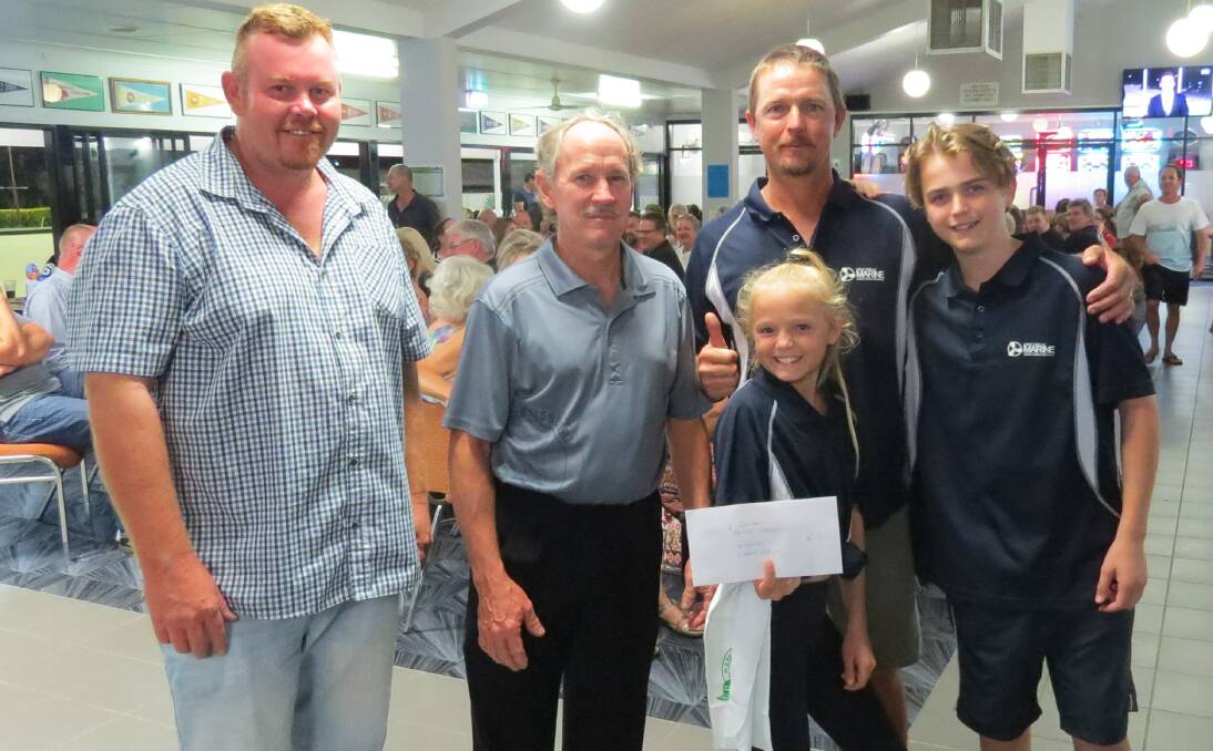 WINNER: Evan Godsall from Bayside Springs (second left) congratulates Eprapah comprising Steve Cain, Evan Godsall, Steve Blain, Syarra Blain and Ary Blain on winning the business and community bowls competition at Victoria Point.