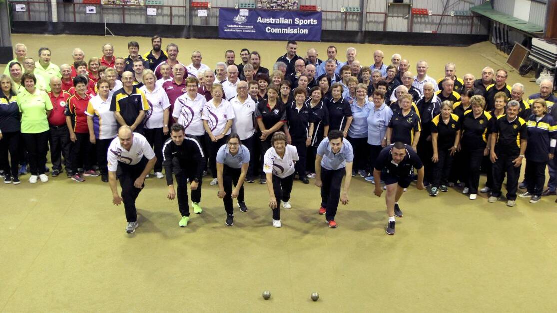 STYLE: Players and Officials at the Australian Bocce Championship with our finest players in front, about to demonstrate their throwing styles.